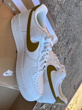 Nike White Leather Sneakers with Bronze Swoosh